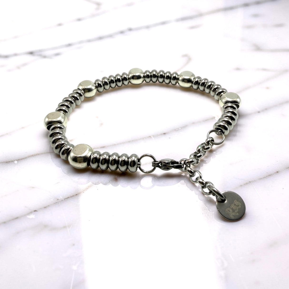 Bracciale Girelle Acciaio e pepite Argento925