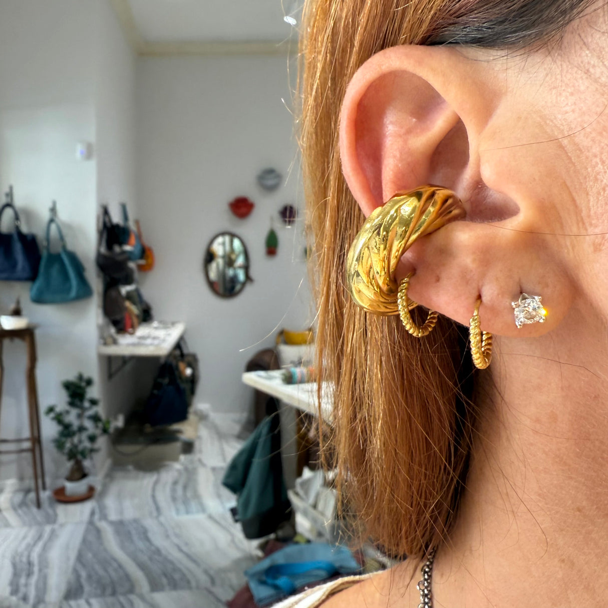 EAR CUFF TORCIONE ACCIAIO DORATO