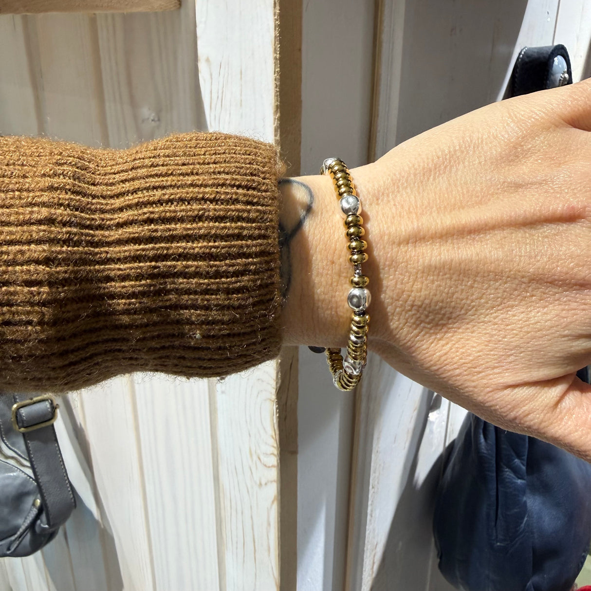 Bracciale Girelle Acciaio gold e pepite cubo Argento925