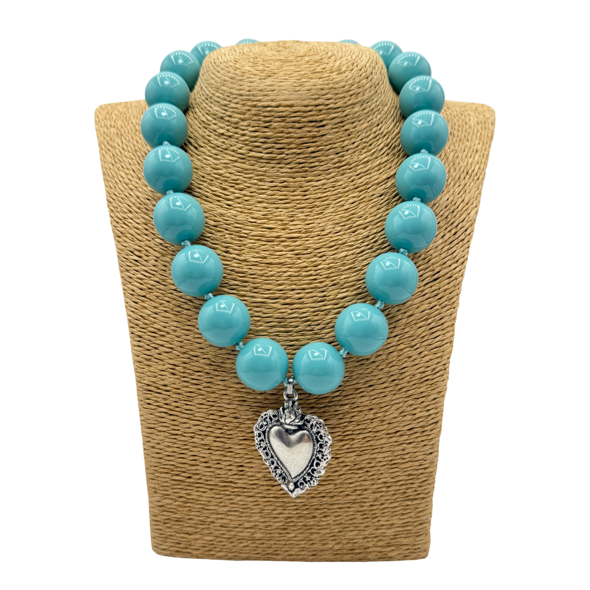 Collana Resina Turchese scuro e cuore sacro