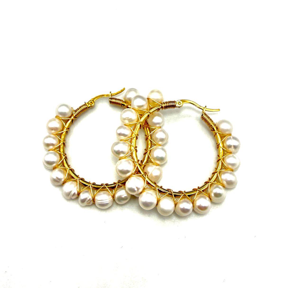 Orecchini Cerchi dorati con perle