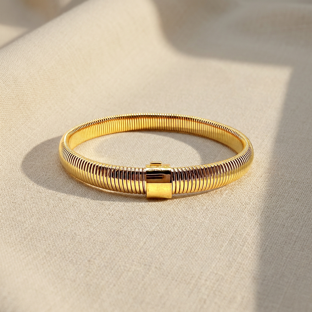 Bracciale Tubogas Dorato su lino beige