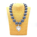 Collana Resina Grigio fumè e Cuore Sacro