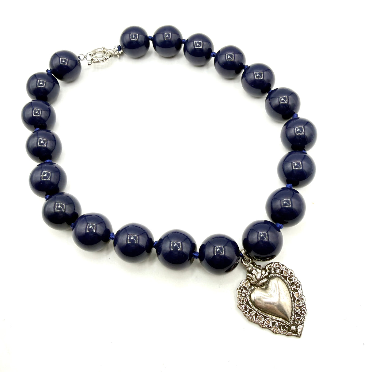Collana Resina Blu scuro e Cuore Sacro