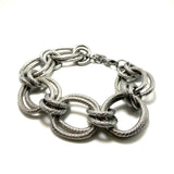 BRACCIALE ANELLI GODRONATI ALTERNATI