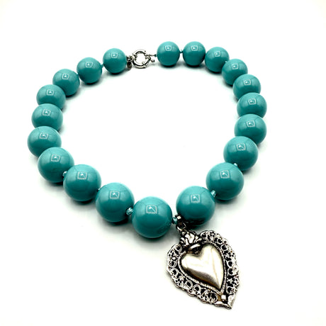 Collana Resina Turchese scuro e cuore sacro