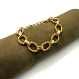 Bracciale rolò torcioni dorati alternati acciaio inossidabile