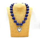 Collana Resina Blu scuro e Cuore Sacro