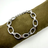 Bracciale rolò torcioni alternati acciaio inossidabile