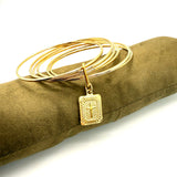 Bracciale rigido 6 fili con medaglia Croce