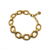 Bracciale rolò torcioni dorati alternati acciaio inossidabile