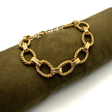 Bracciale rolò torcioni dorati alternati acciaio inossidabile