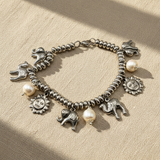 Bracciale Lucky Rainbow Cammello Sole Elefante - sfondo beige