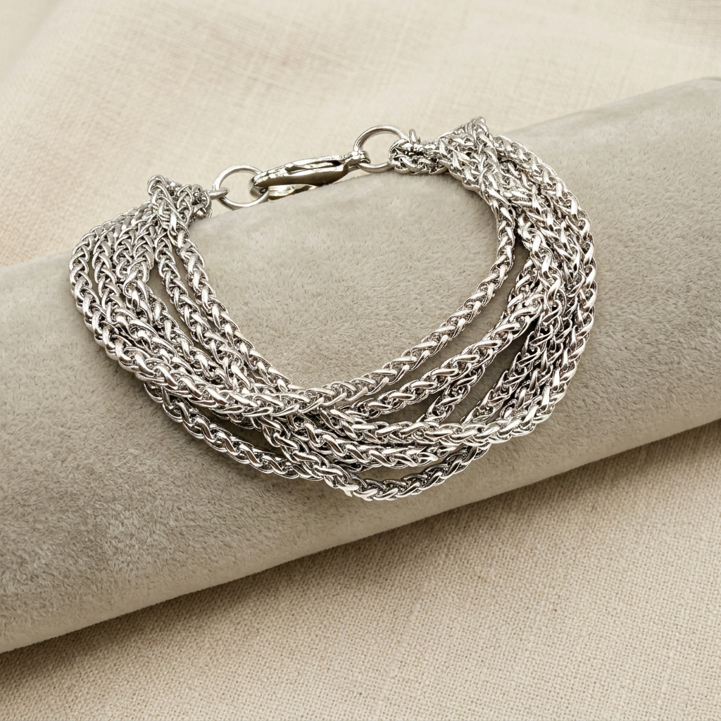 Bracciale Multifili Spiga con cuscino chiaro su lino beige