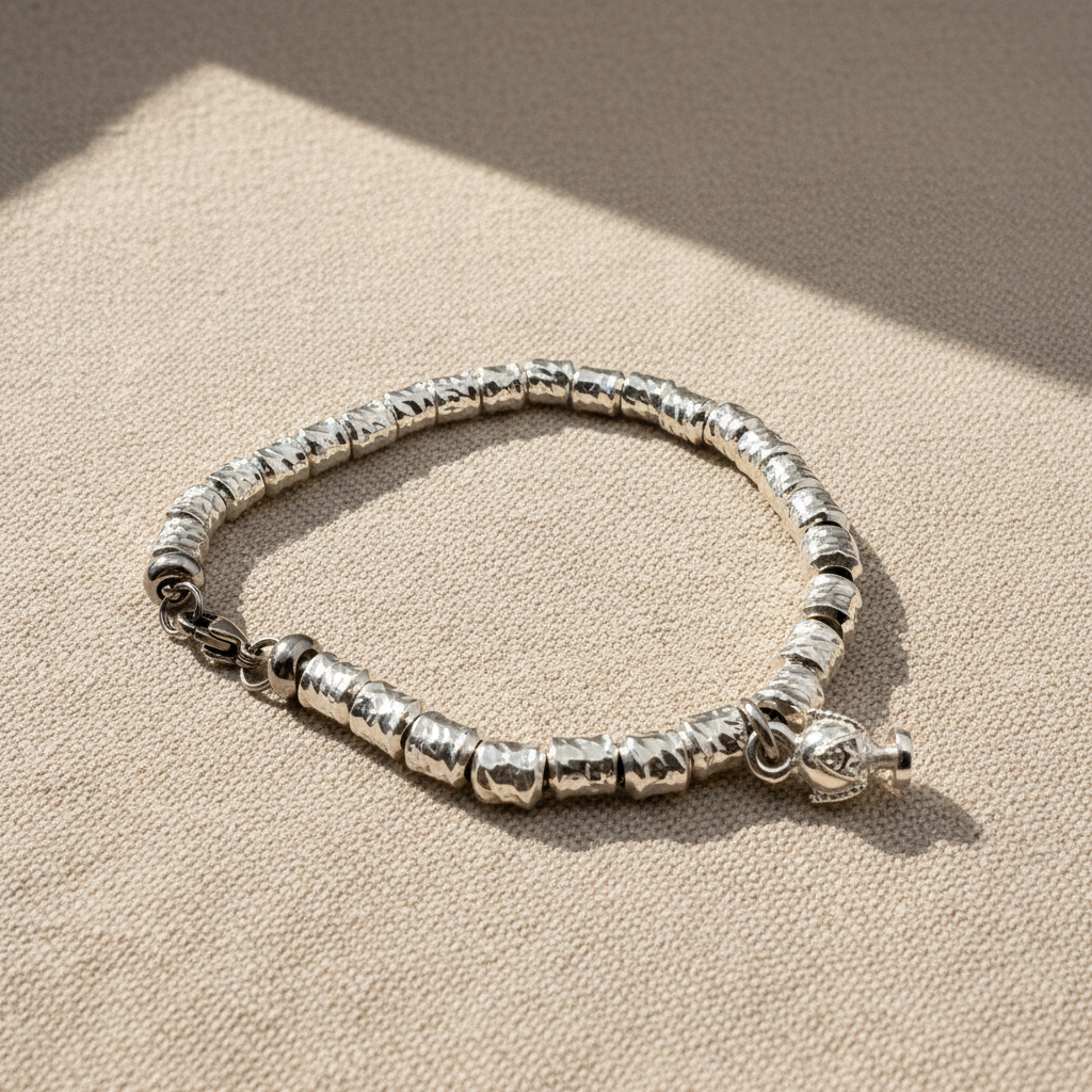 Bracciale pepite e pumino con moschettone