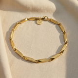 Bracciale Segmenti acciaio Dorato su lino beige