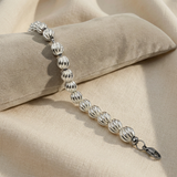 Bracciale su lino beige, quarta foto