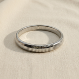 Bracciale Tubogas acciaio Silver 1 cm su lino beige