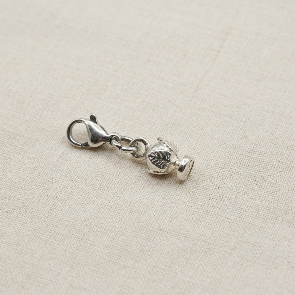 Charm Pumino Argento925 su lino beige