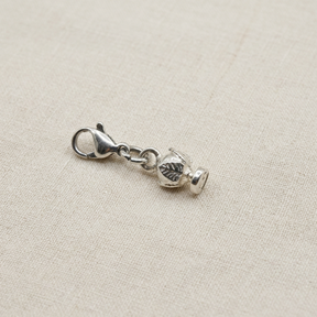 Charm Pumino Argento925 su lino beige