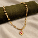 Collana Maglia Staffa Gold e Cuore Sacro su lino beige